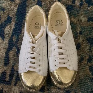 White and Gold Sneakers by Andrew Stevens